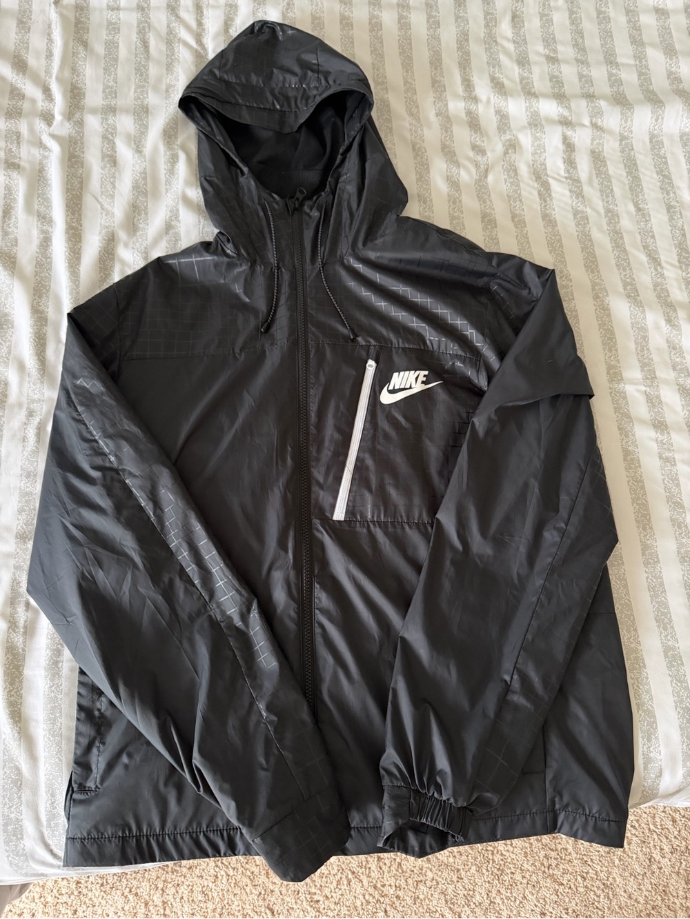 Nike Black Hooded Rain Jacket with White Zip Accent